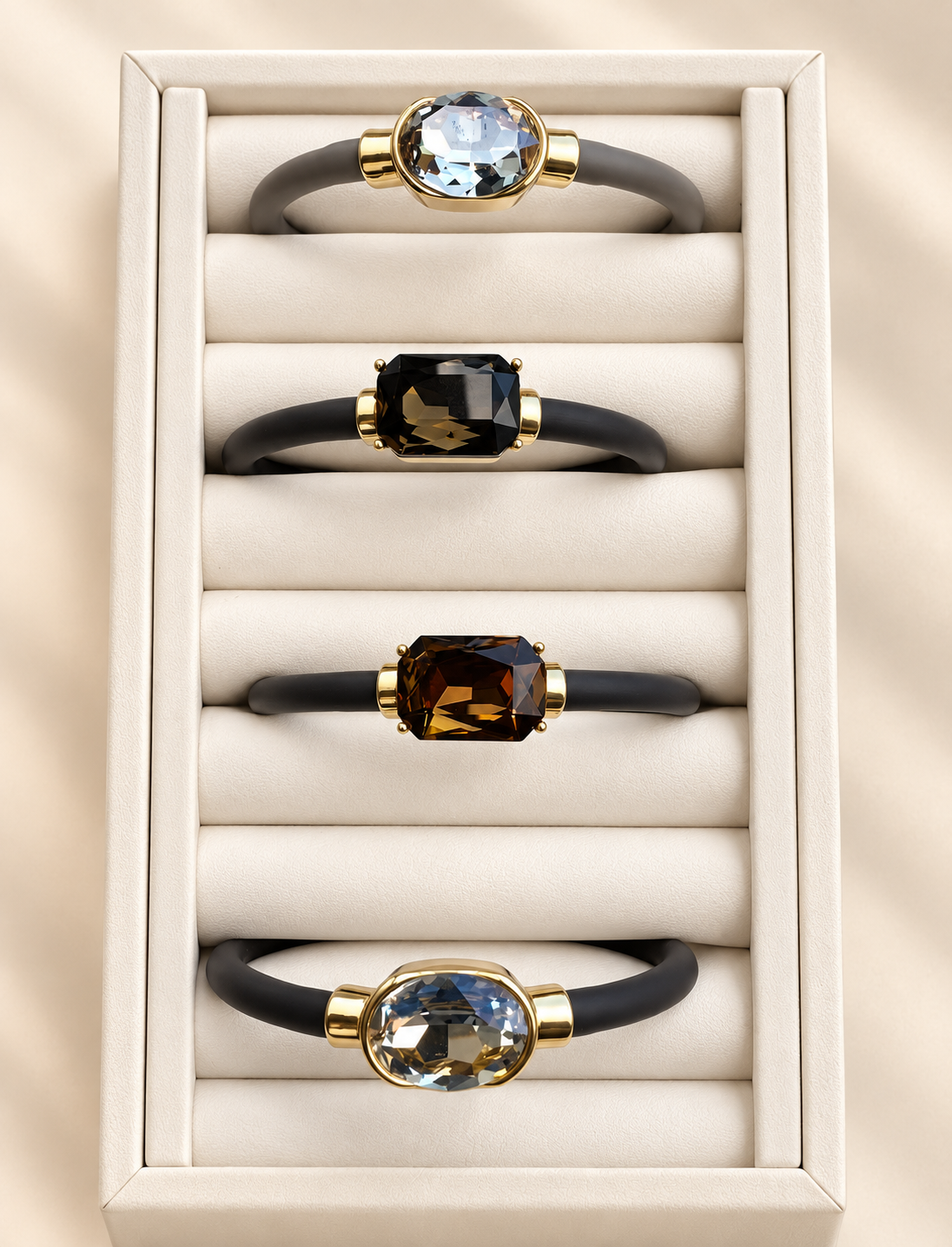 Neutral gemstone bracelets in crystal, black, brown, and gray